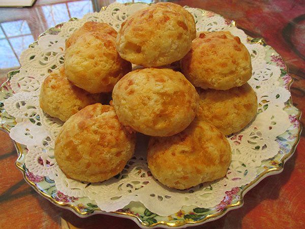 A plate of cheesy biscuits