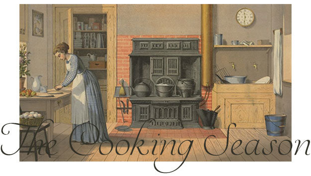 Drawing of a woman in a kitchen with a wood burning stove working at a table