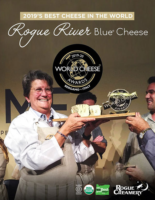 woman receiving world cheese award